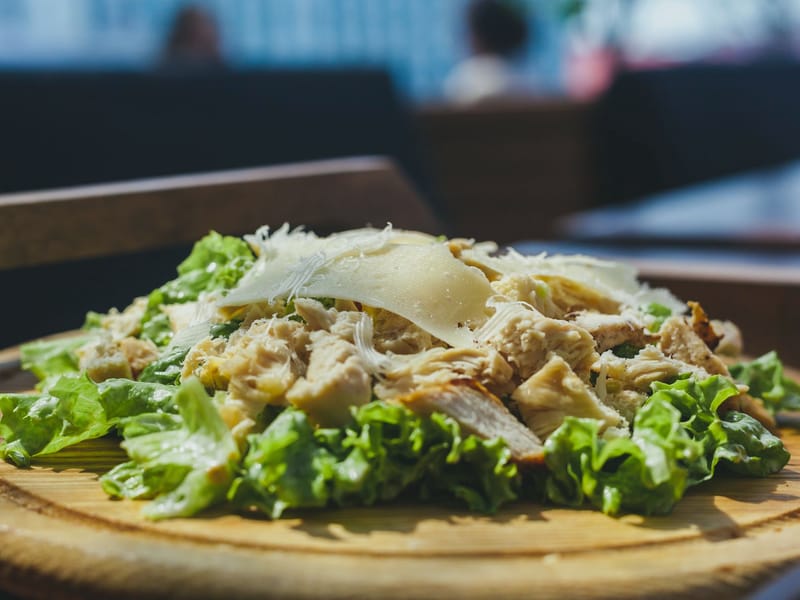 Baked Chicken Thighs with Arugula Caesar Salad — Dinner, 566 kcal, 52g protein